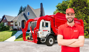 a man in a red shirt stands in front of a garbage truck